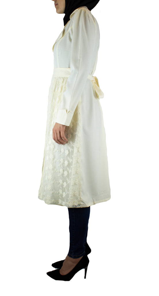creme long sleeved cardigan embellished with creme lace with pockets and a waist tie