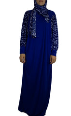 royal blue one piece abaya with arabic calligraphy detailing and a hijab attached
