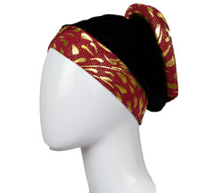velvet bonnet cap turban with jewels and a floral embellishment 