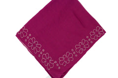 magenta square hijab with jewels along the trim in a floral pattern