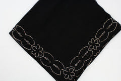 black square hijab embellished with jewels on the edges in a floral and geometric pattern