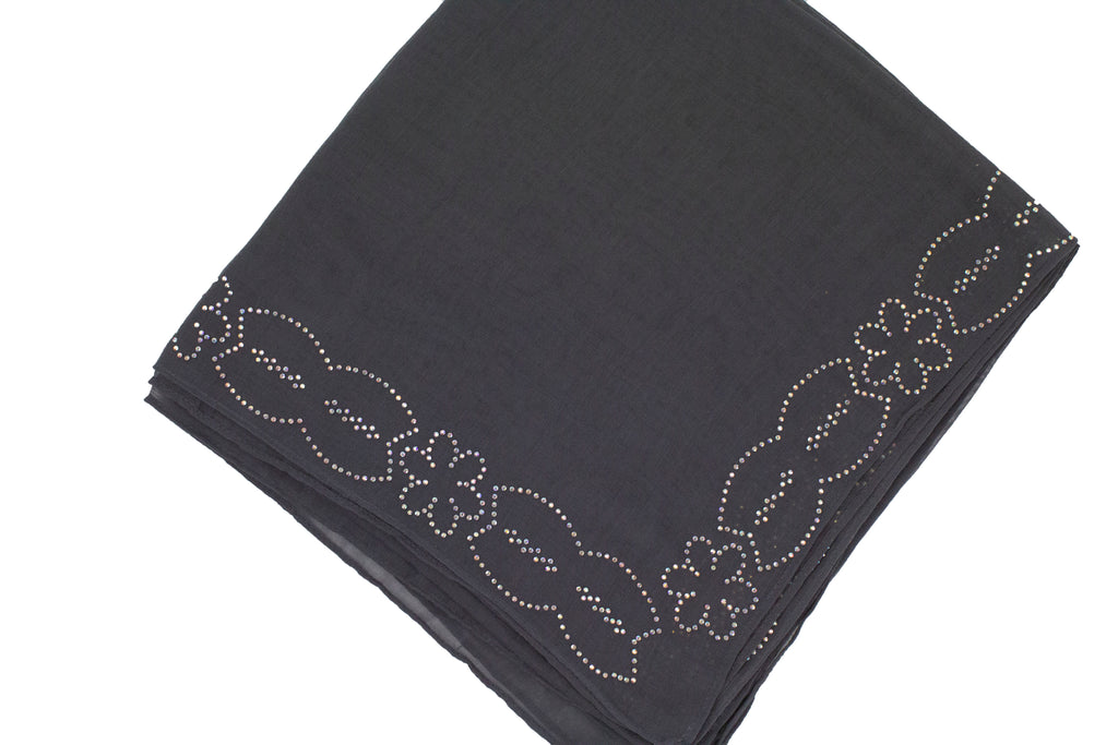 dark gray square hijab with jewels along the trim in a floral and geometric pattern