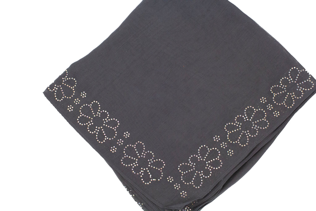 dark gray square hijab with jewels along the trim in a floral and geometric pattern