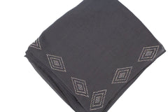 dark gray square hijab with jewels along the trim in a diamond shape