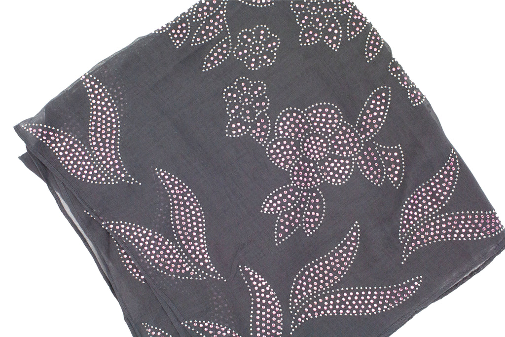 dark gray square hijab with light pink jewels in a floral pattern