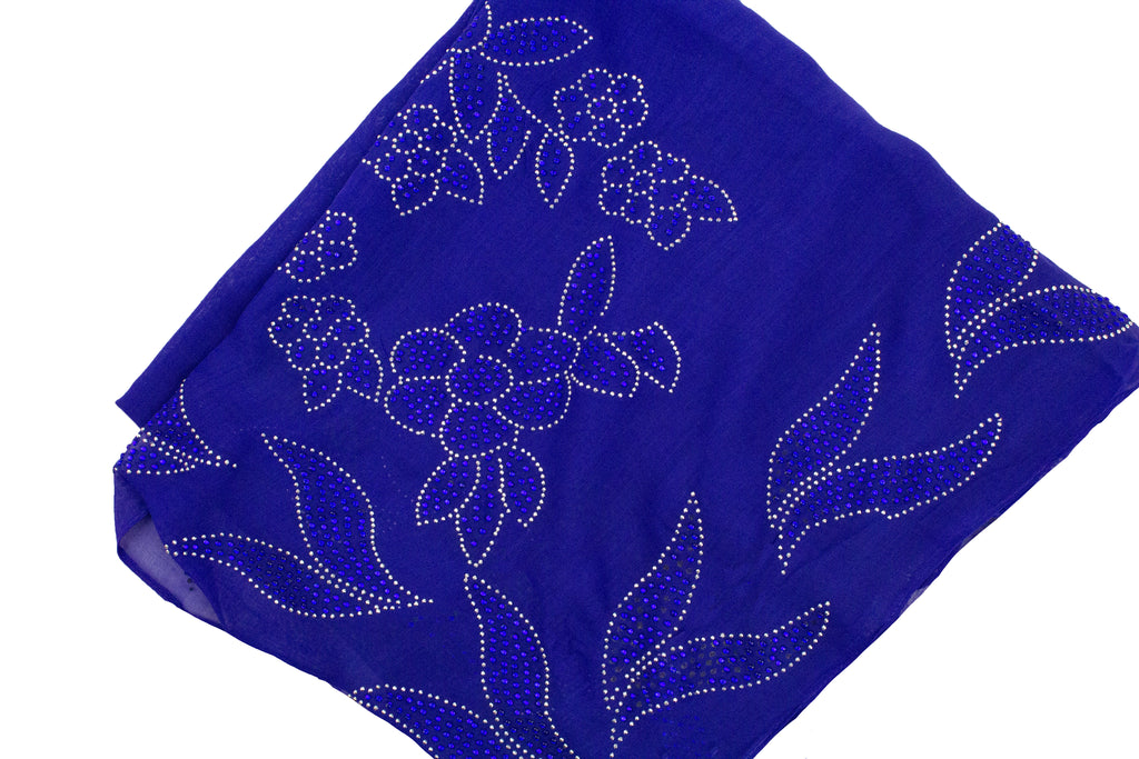 royal blue square hijab with blue jewels in a floral pattern
