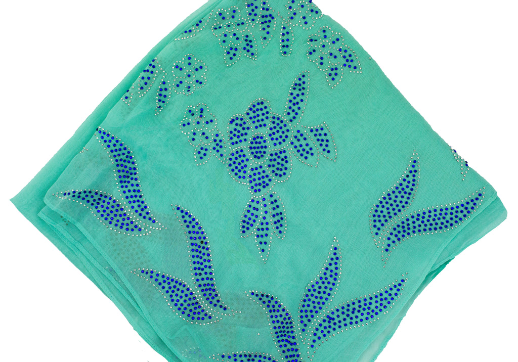 teal square hijab with blue jewels in a floral pattern