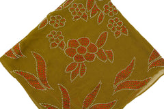 olive square hijab with red jewels in a floral pattern