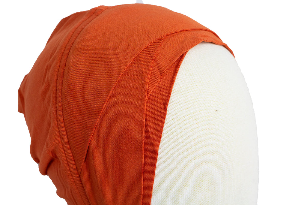 orange criss cross ninja under cap for the hijab