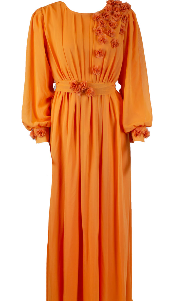orange long sleeve maxi dress with 3d floral applique across the chest, sleeves, and belt