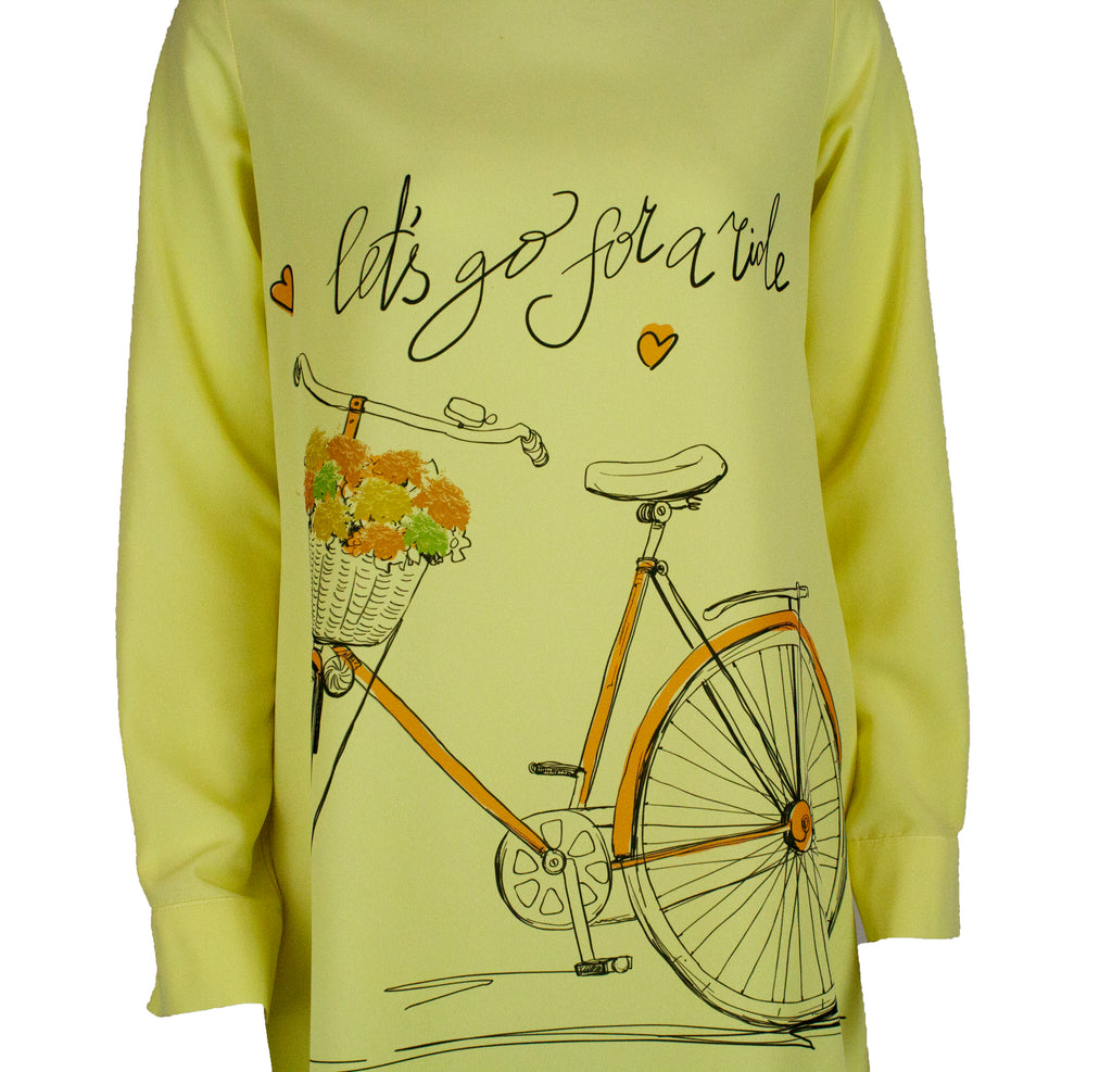 Long sleeved blouse in yellow with printed bike and "let's go for a ride"