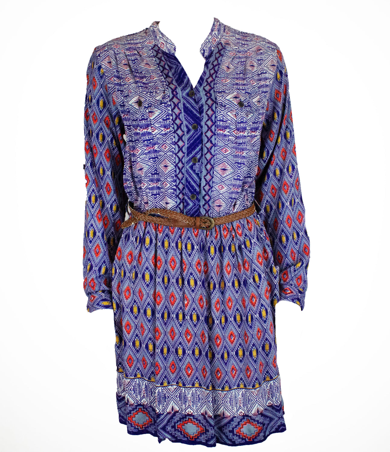 long sleeved baby doll top with geometric design pattern in blue white indigo and orange paired with a brown woven belt