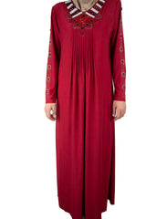 maroon abaya with pleats on the chest and jewels along the neckline and arms