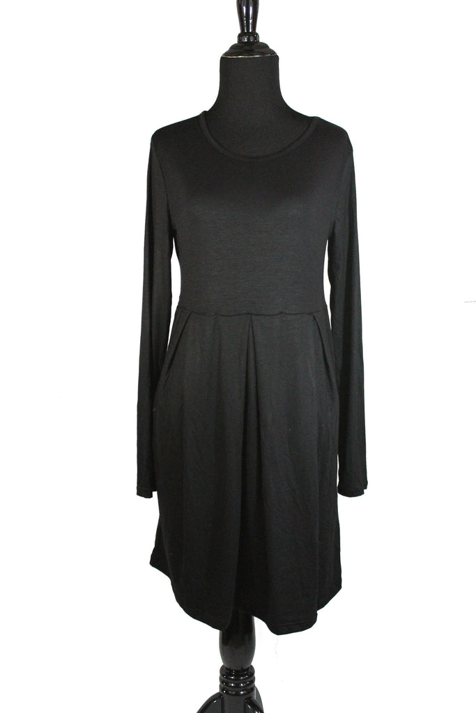black long sleeved midi top with an aline and pleats