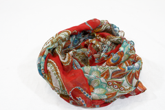 red hijab with paisley print in tan blue and brown