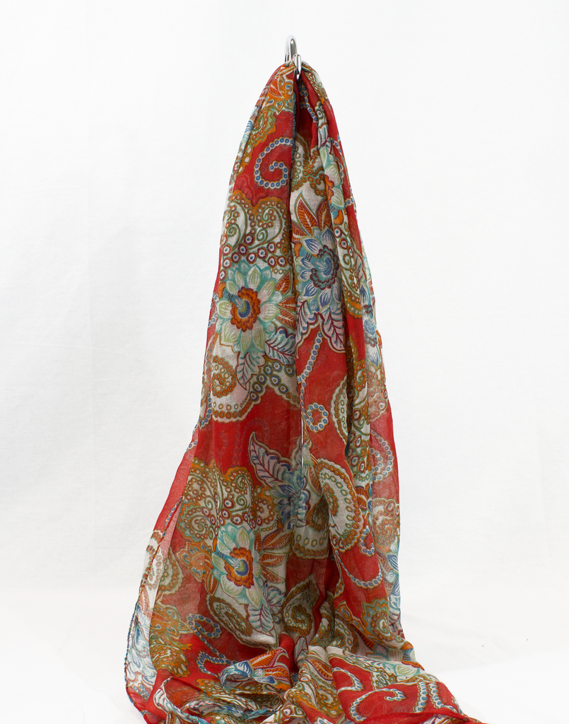 red hijab with paisley print in tan blue and brown