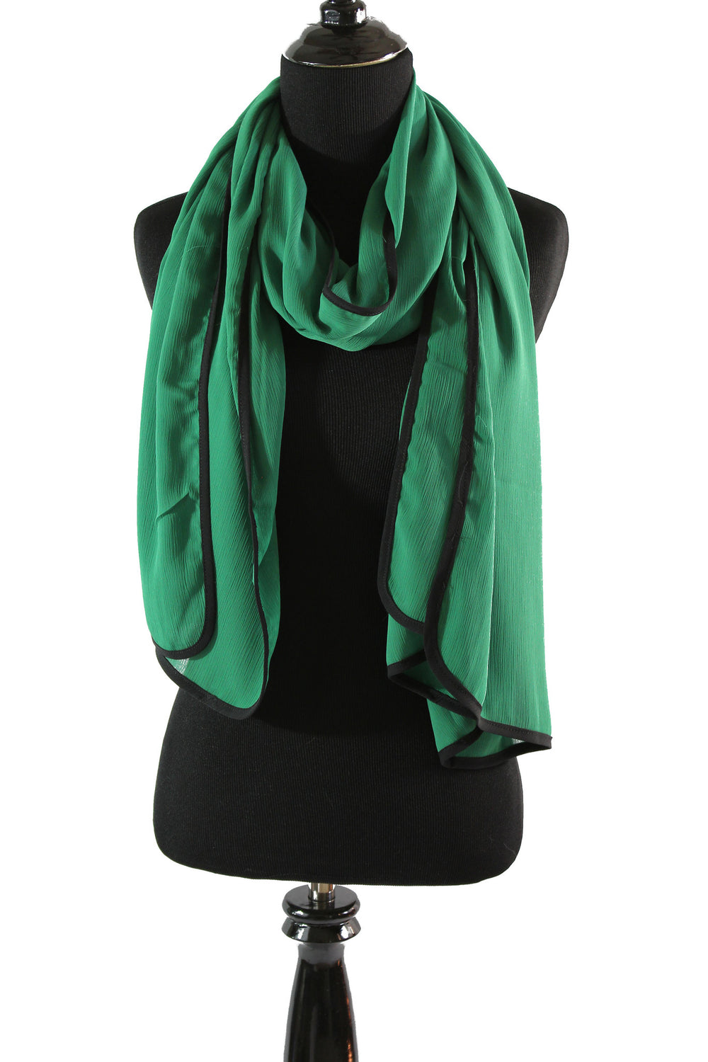 green chiffon hijab with a black trim along the edges