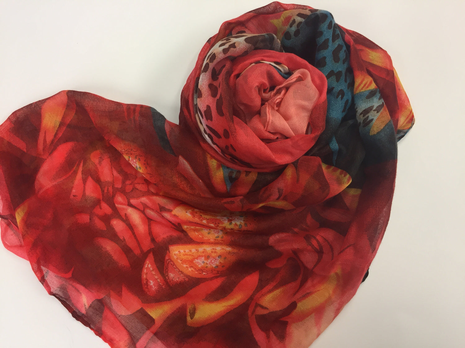 mixed print hijab in red, blue, and orange