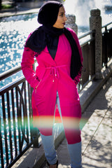 magenta pink open front long sleeve cascade jacket with pockets and zipper closures with a waist tie