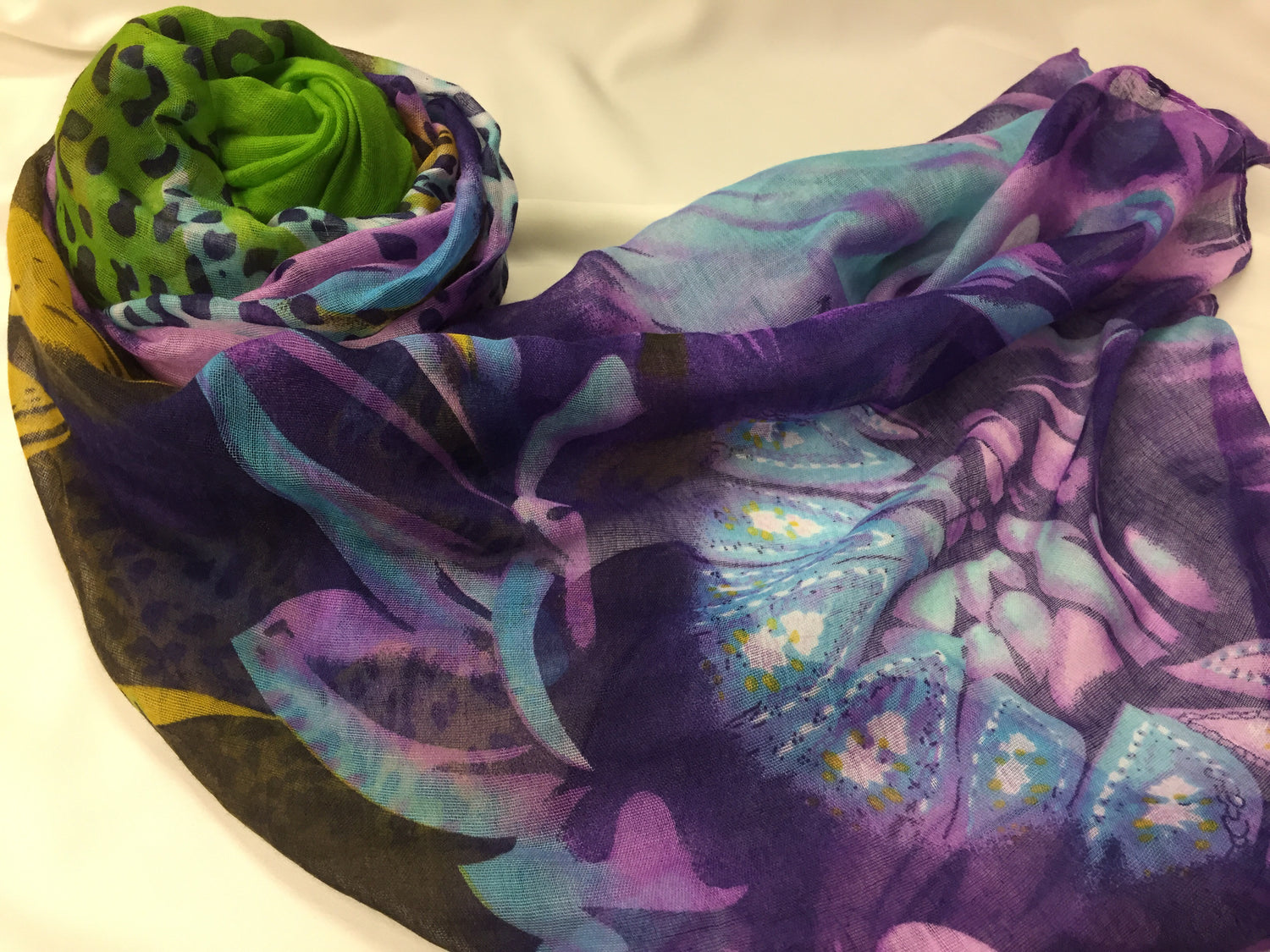purple and green print hijab with cheetah print and floral 