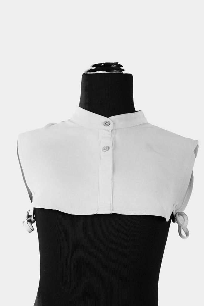 white fake collar with buttons
