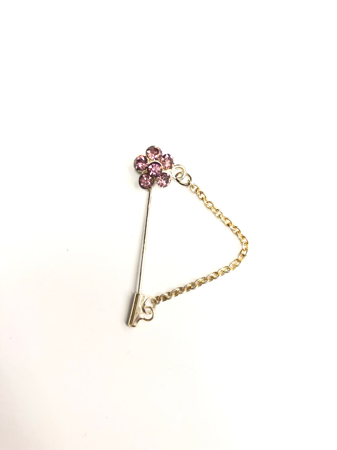 silver clasp pin with light pink floral jewel and a chain