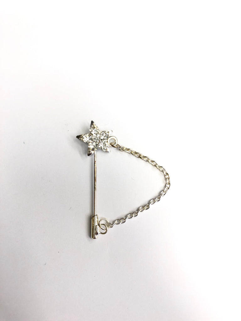 star shaped hijab pin with white jewels and a clasp at the end