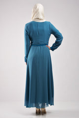 long sleeve maxi dress with front pockets on the chest breastfeeding friendly dress with buttons on the chest and a collar and waist tie