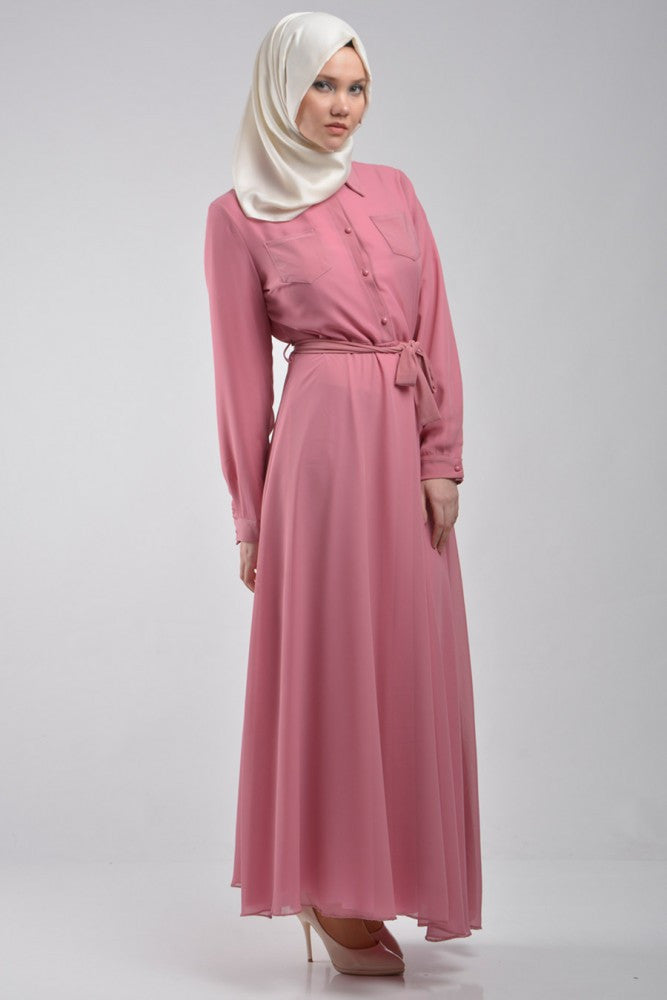 long sleeve maxi dress in pink with pockets and a waist tie