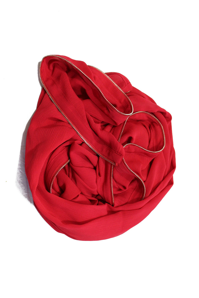 red chiffon hijab with gold zipper embellishment along the edges